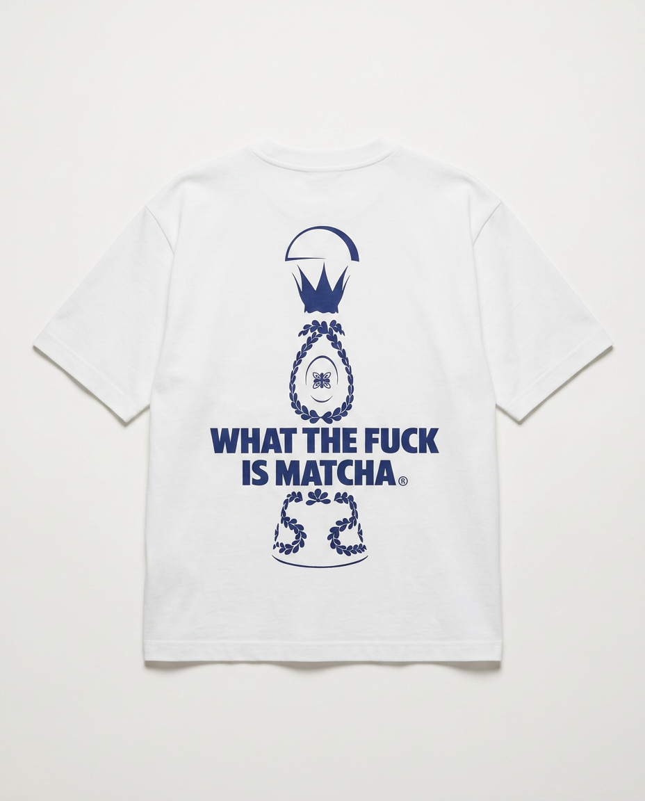 Studio product shot of the back of the oversized white tee with the navy Drop 001 print